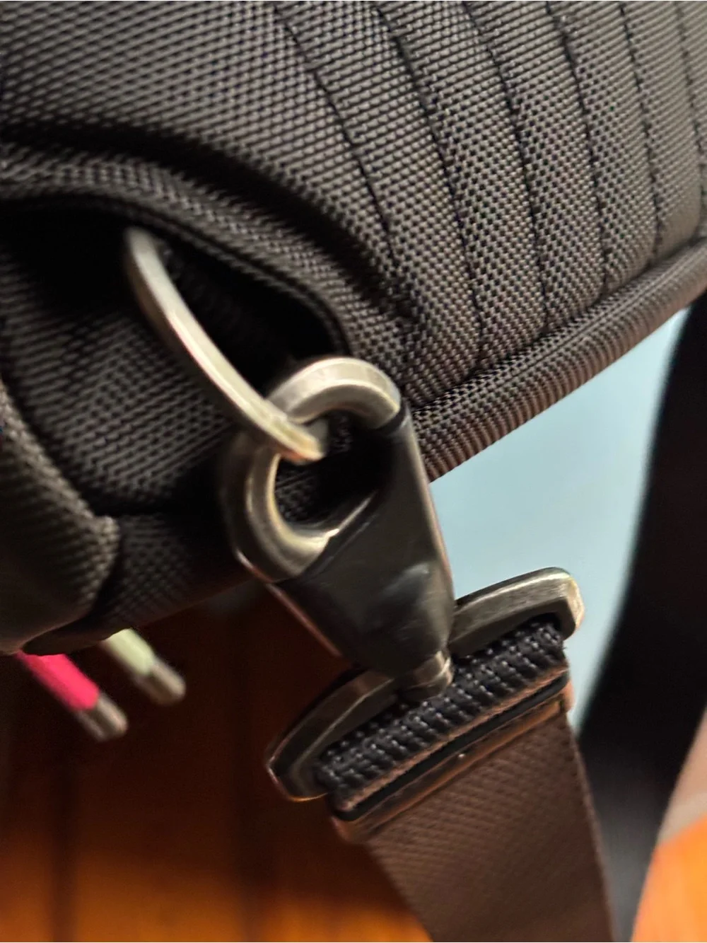 Tumi FIFE Gray SLIM Sling Bag dark grey and black.